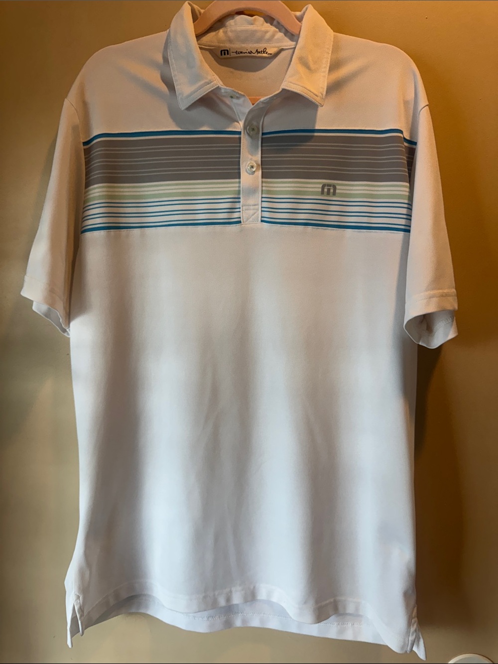Travis Mathew Performance Golf Polo with Blue and Gray Stripe Chest Band